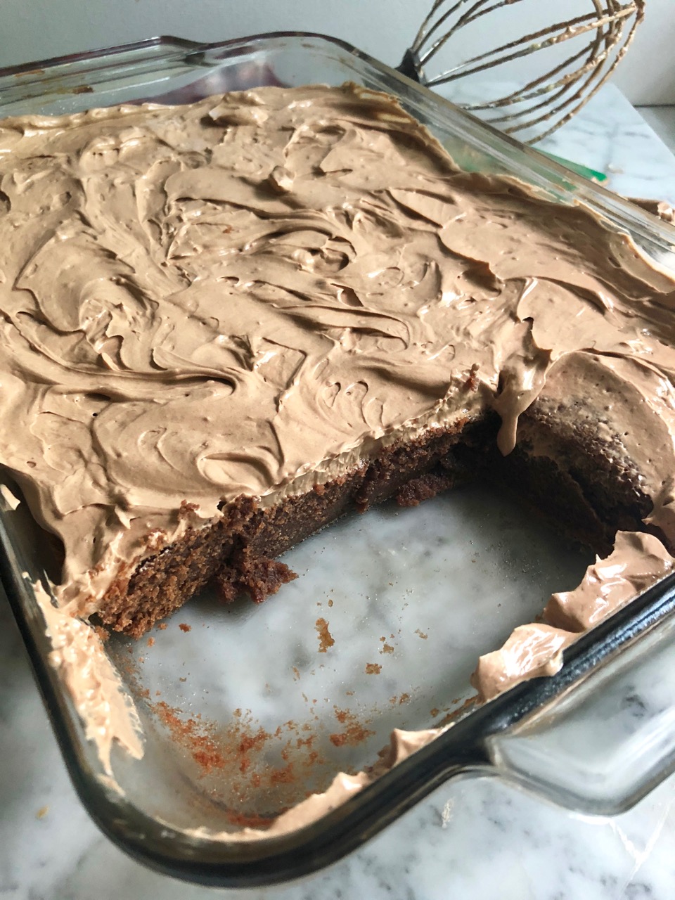 Dense fudgy malt brownies with buttercream icing